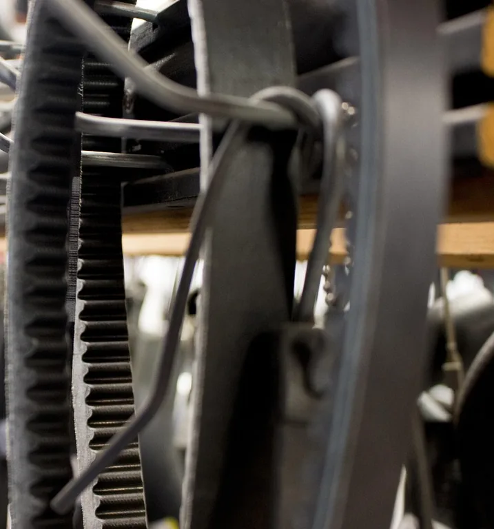 A toothed belt on a work surface