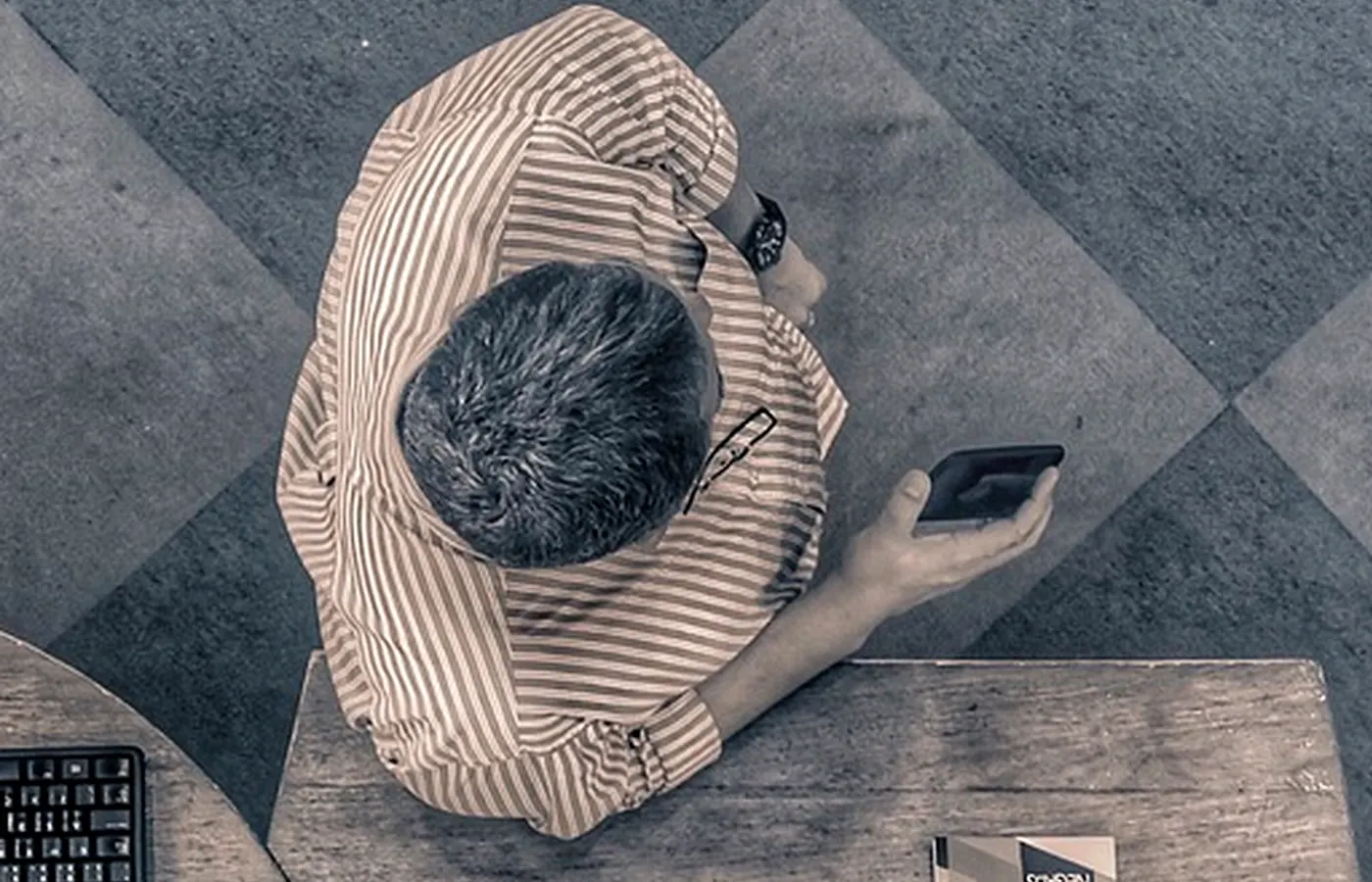 A person on a phone, seen from above