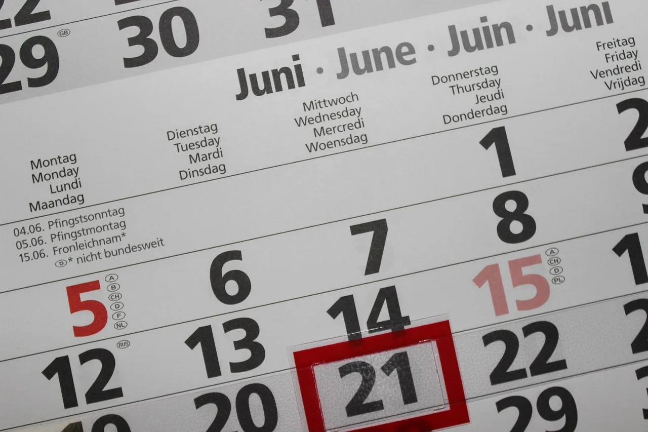 A wall calendar page with one date marked in a red box