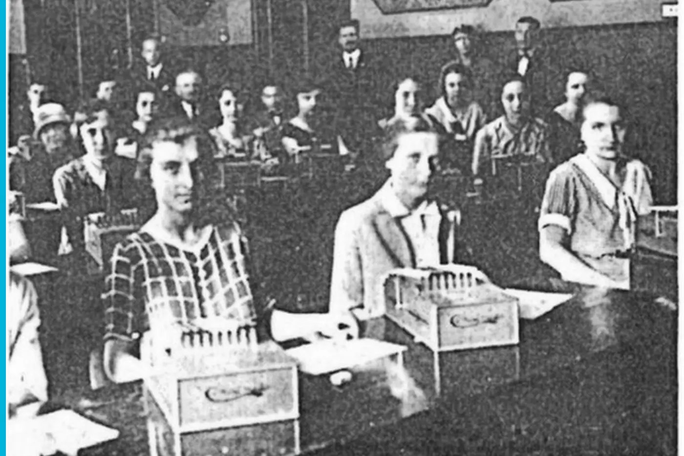 Comptometer operators at their machines in one room
