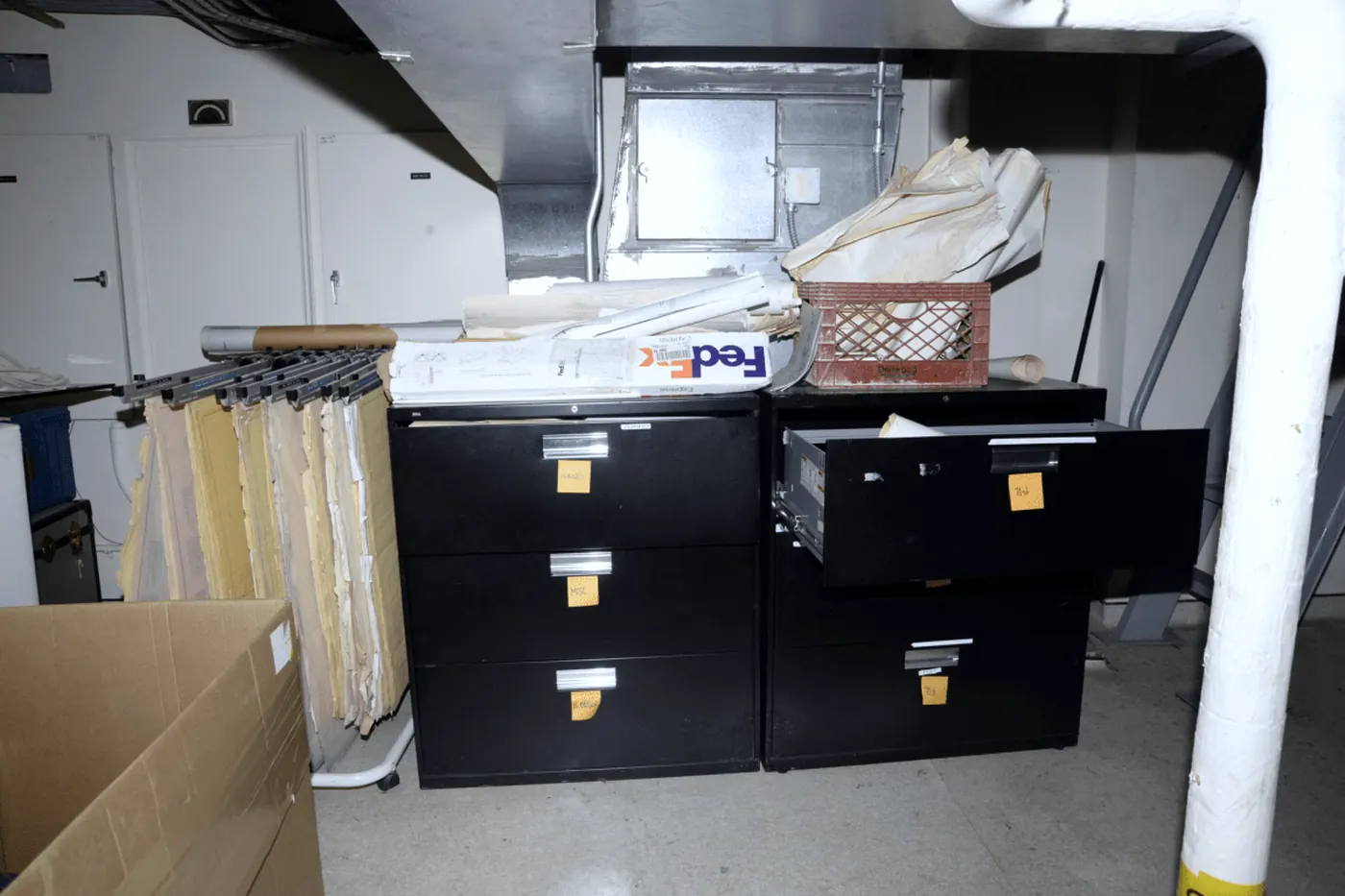 Open filing cabinets with hanging folders