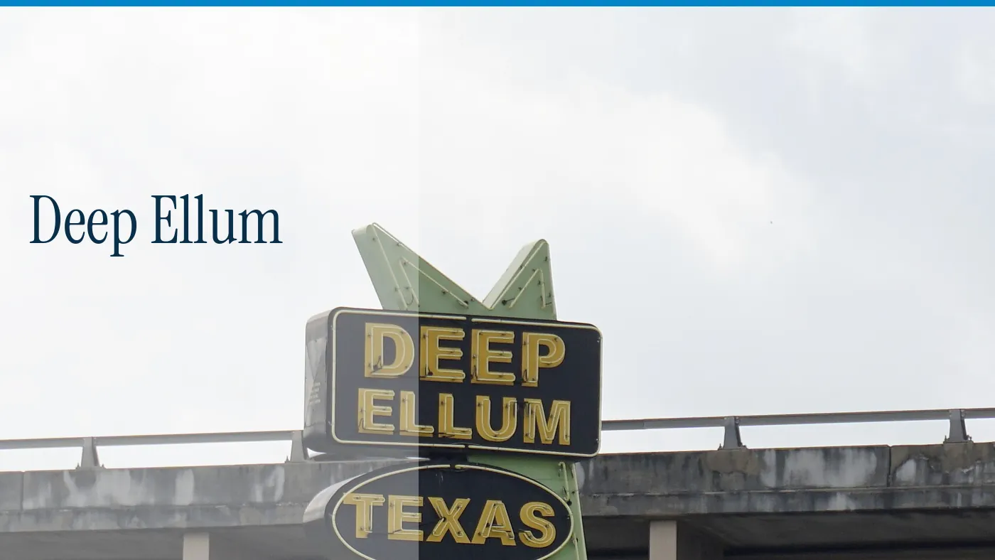 The Deep Ellum neon sign against a pale sky, with the words Deep Ellum in large type
