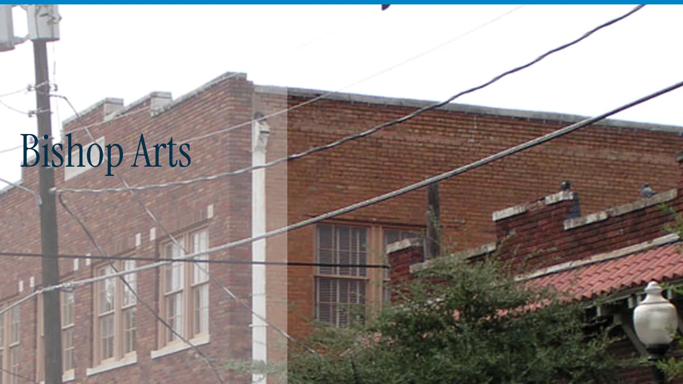 Brick storefronts in Bishop Arts, with the words Bishop Arts in large type