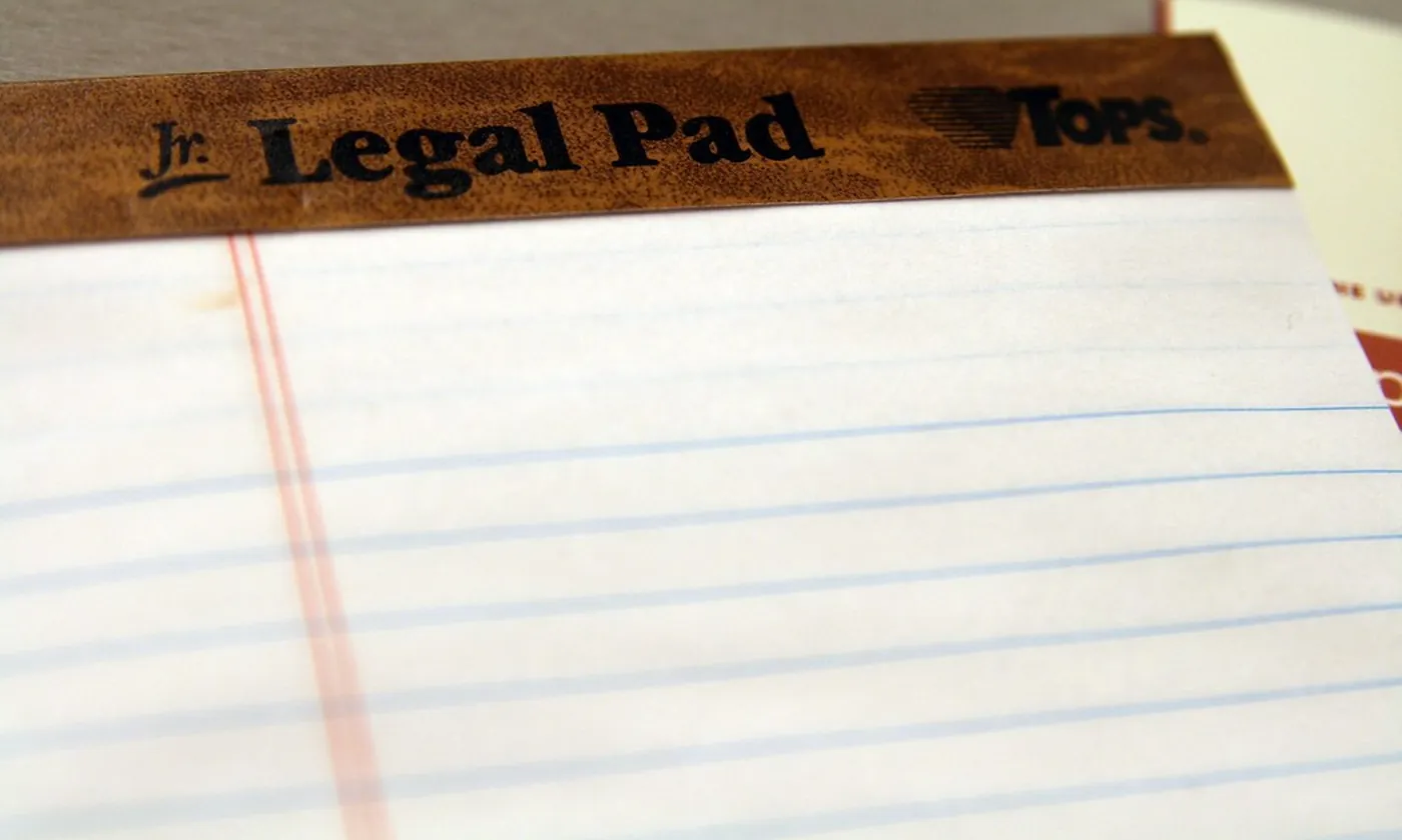 A blank yellow legal pad