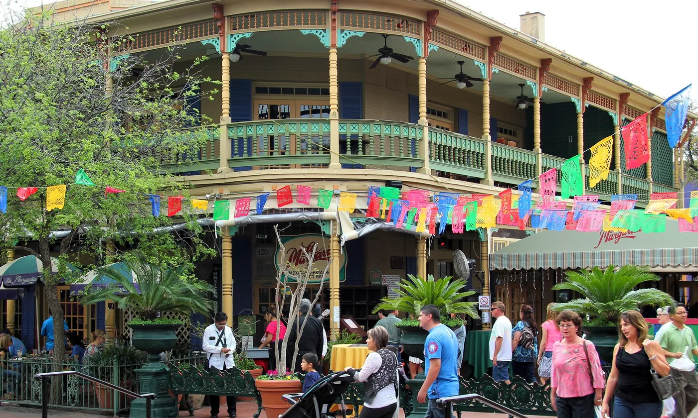 Shops with papel picado strung across the front at Market Square in San Antonio