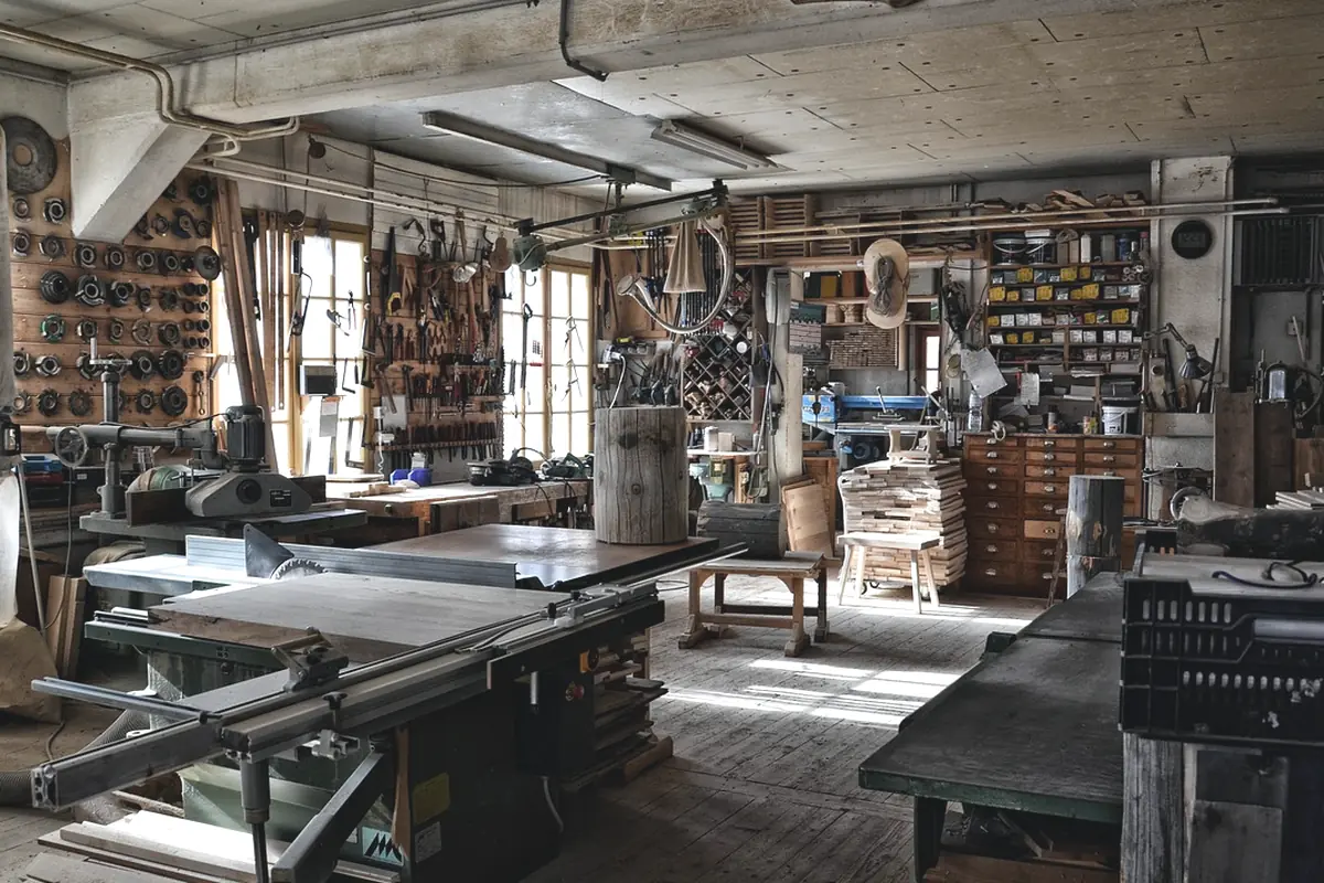 A workbench and hand tools inside a shop