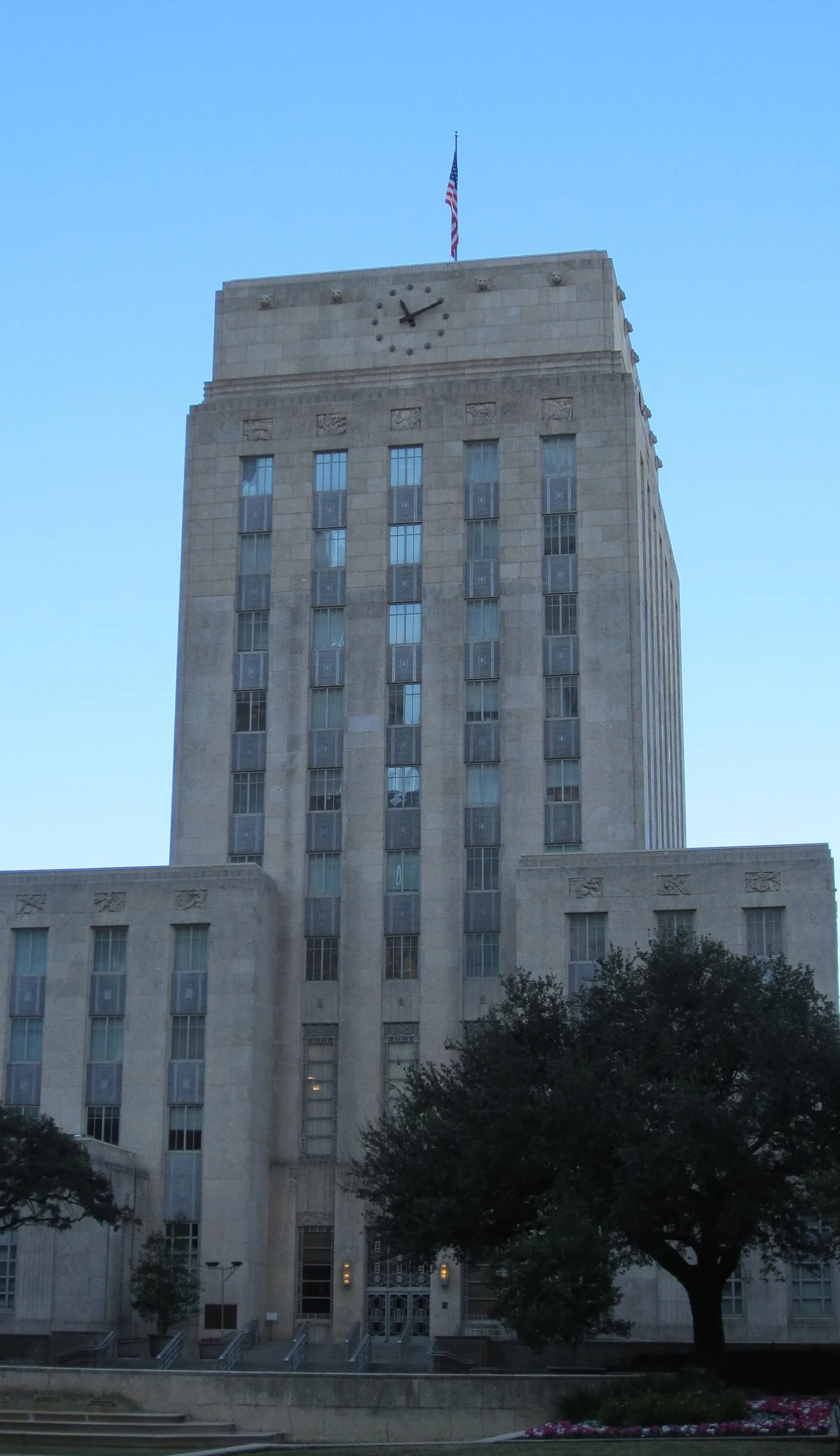 City Hall tower with the flag and the clock