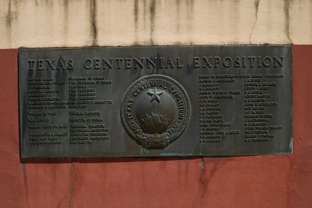 A bronze Texas Centennial Exposition plaque in Dallas, with 1836 and 1936 on the seal