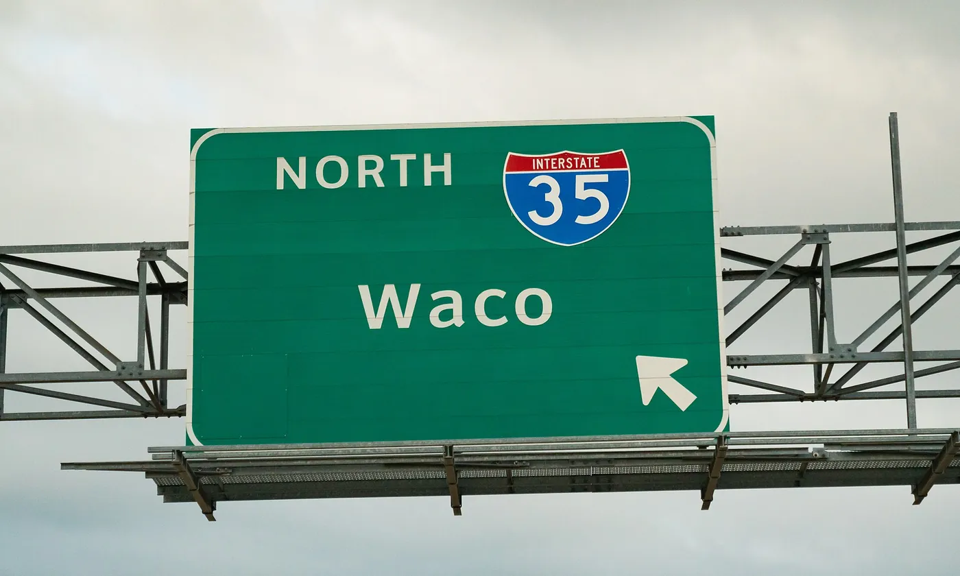 An Interstate 35 North sign for Waco over the highway