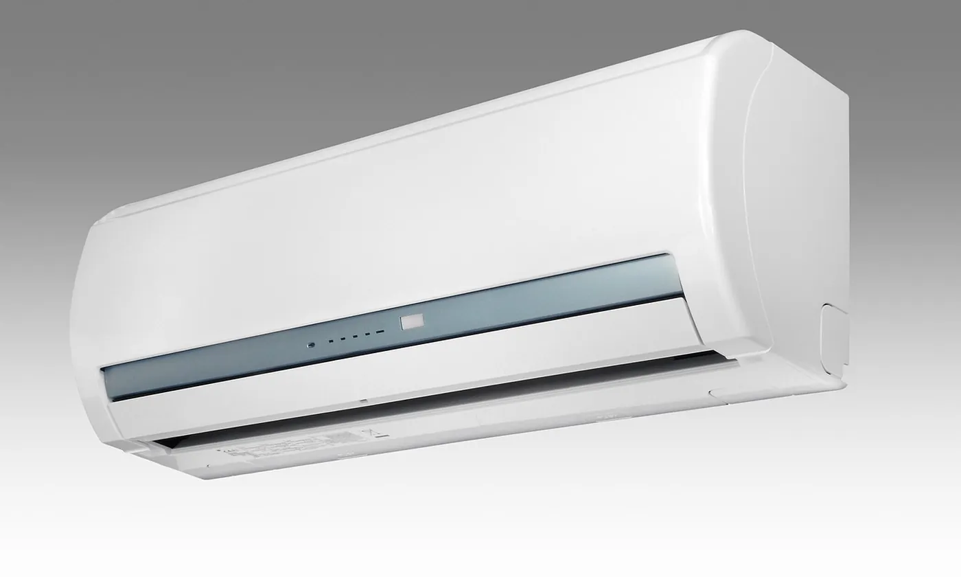 A wall mounted unit on a gray wall