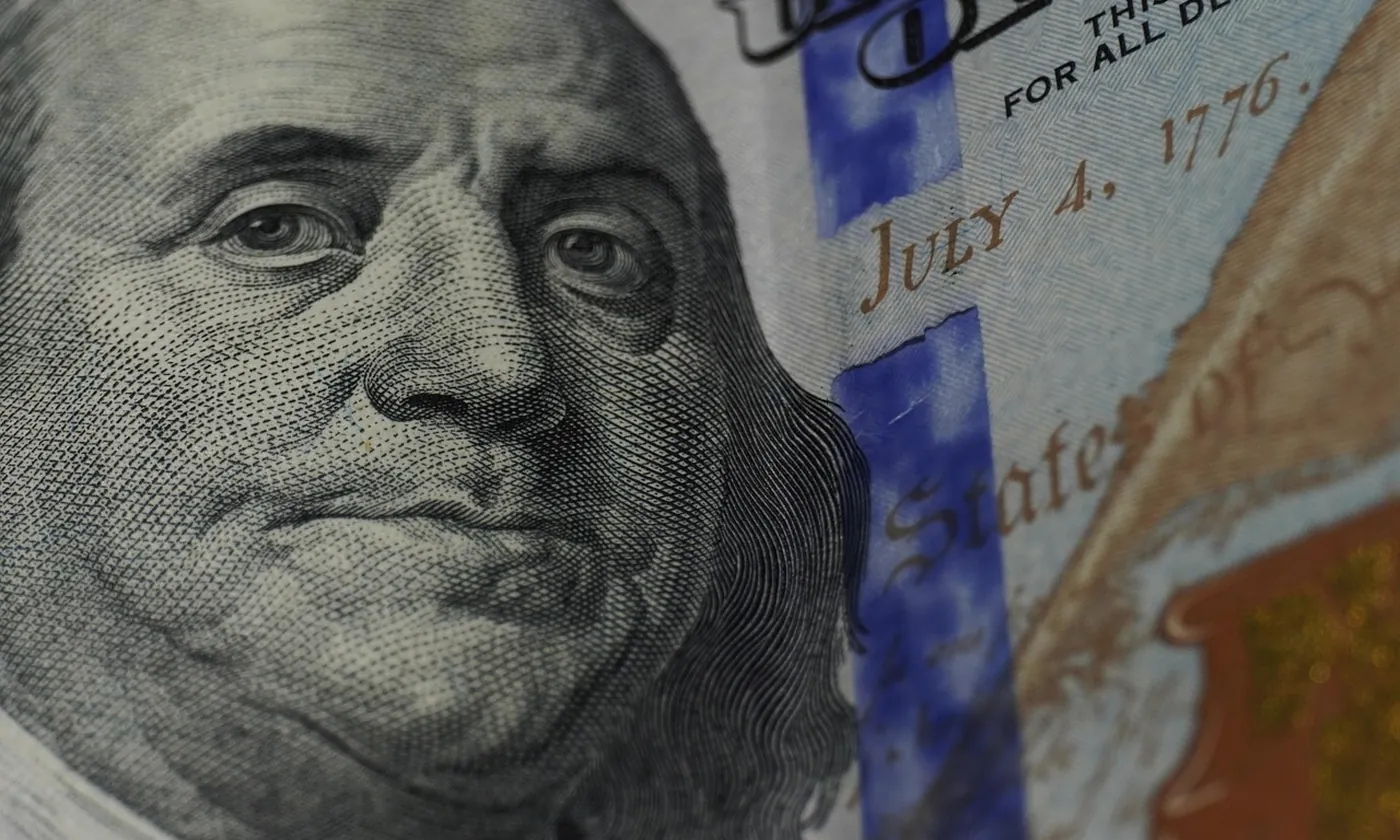 A close view of a United States one hundred dollar bill