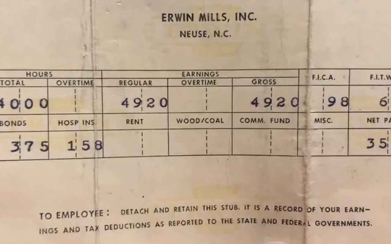 A mill pay stub with hours, gross earnings, tax withheld, and net pay.