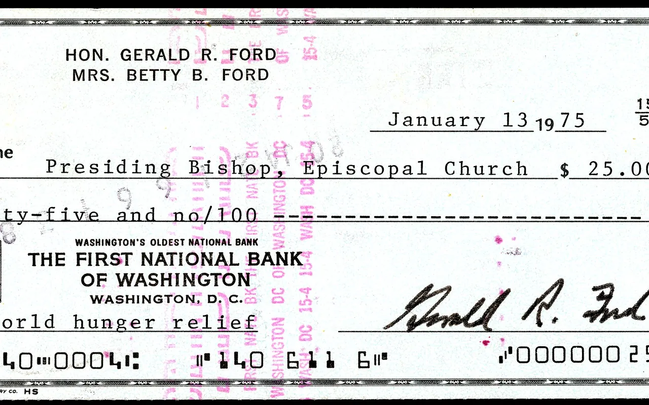 A signed bank check with the amount written on the line and a memo underneath.