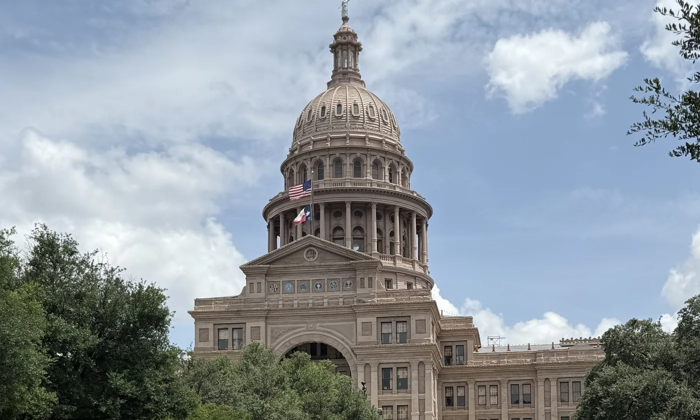 The Texas State Capitol in Austin, dome above the grounds