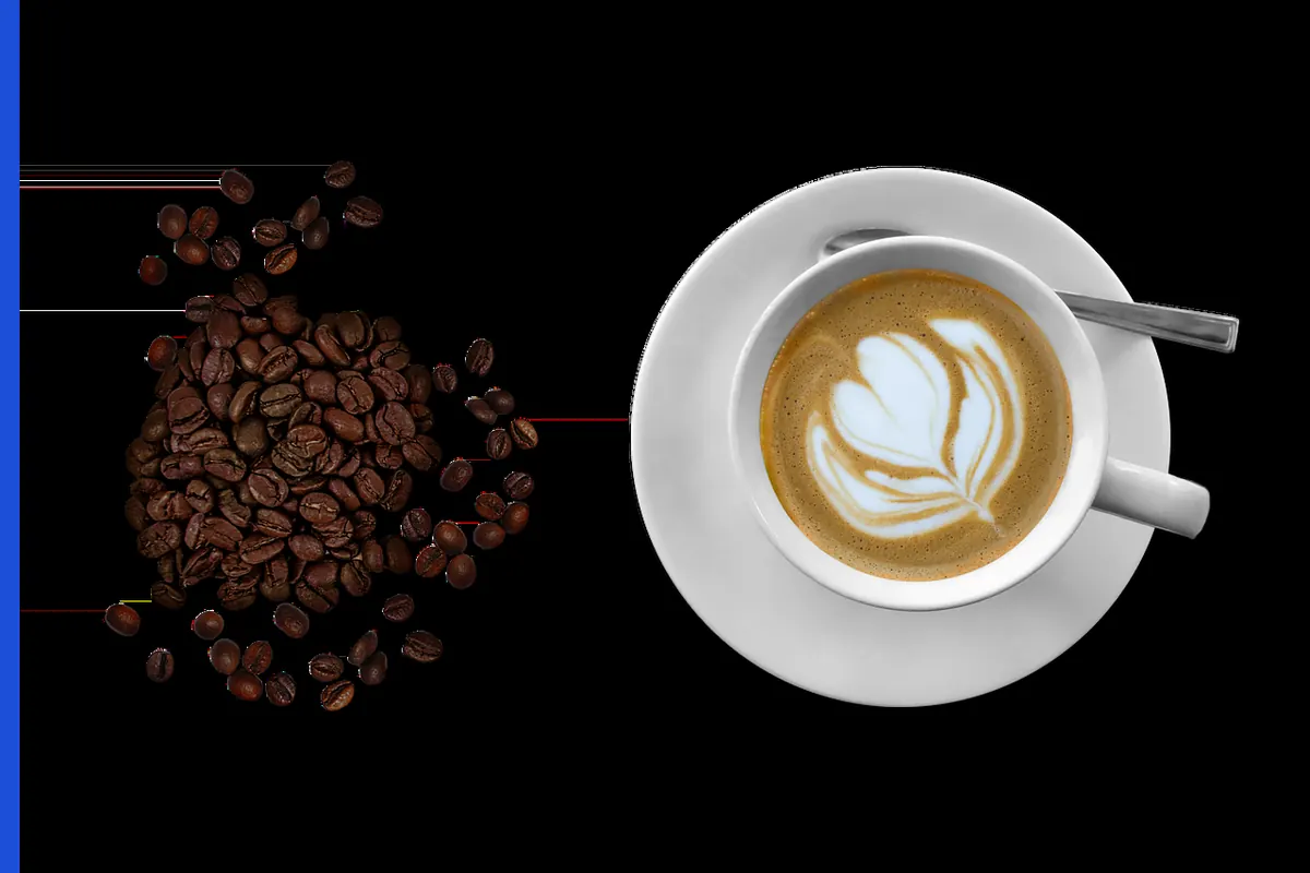 A white cup and saucer with a spoon, no logo.