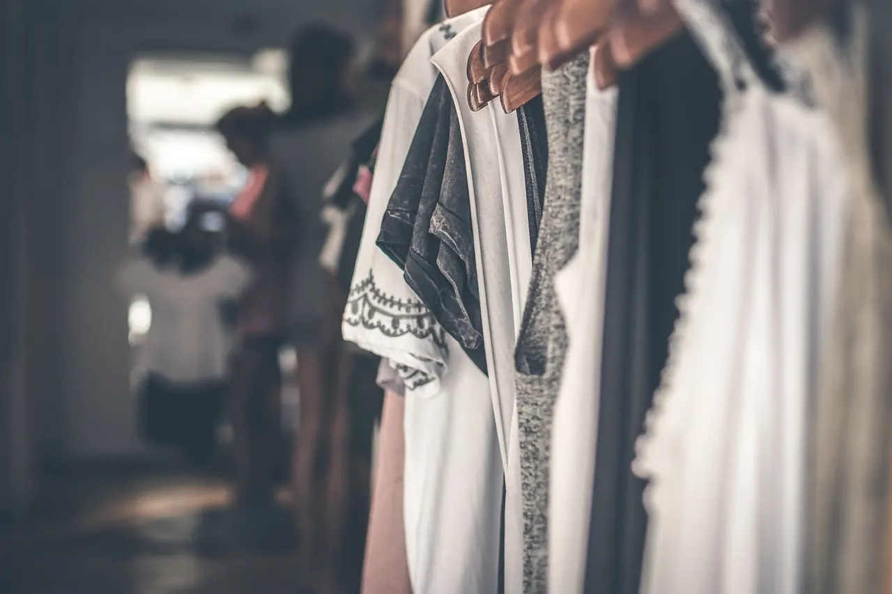 Clothing on a shop rack, with no price tag readable.