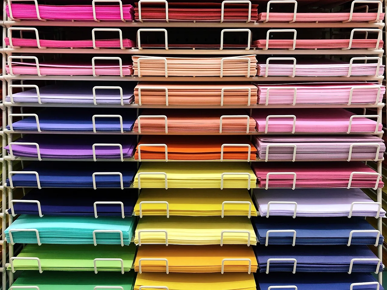 Sheets of colored craft paper on a table