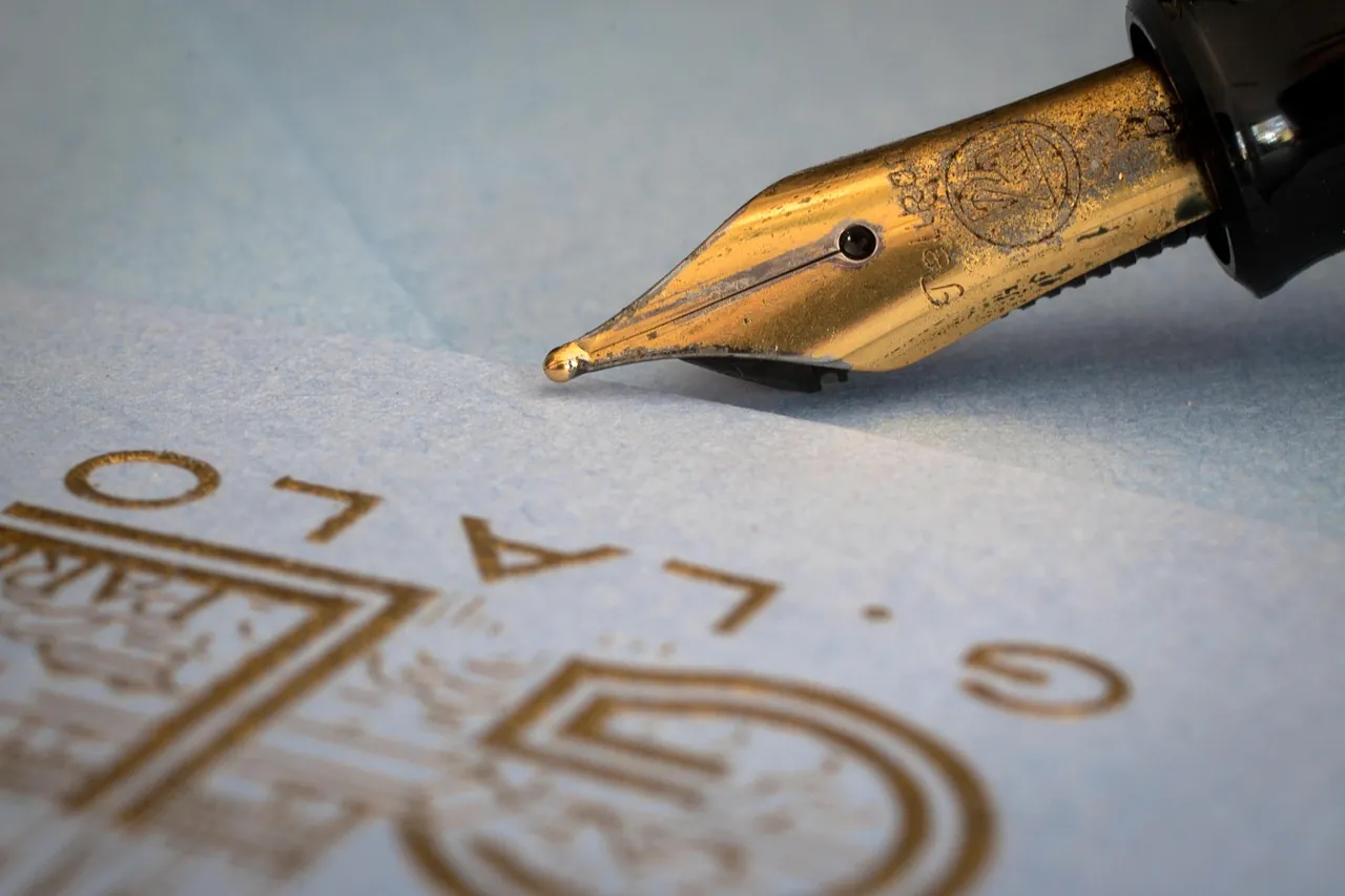 A fountain pen lying on blank paper
